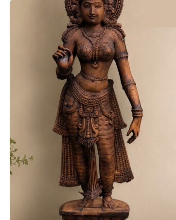 Carved teak figure of a goddess