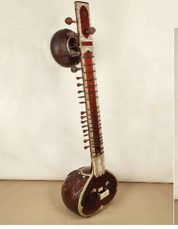 Antique sitar with inlaid gourd body